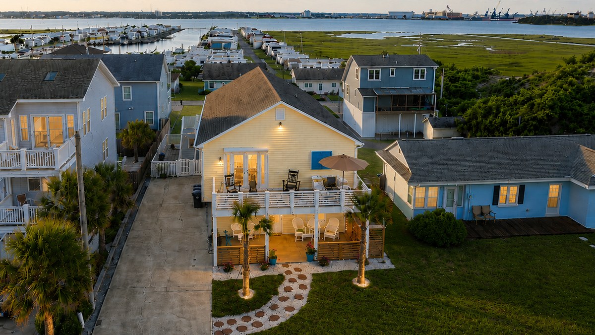 Aerial view of Barefoot Beach Club at sunset, between the sound and the ocean
