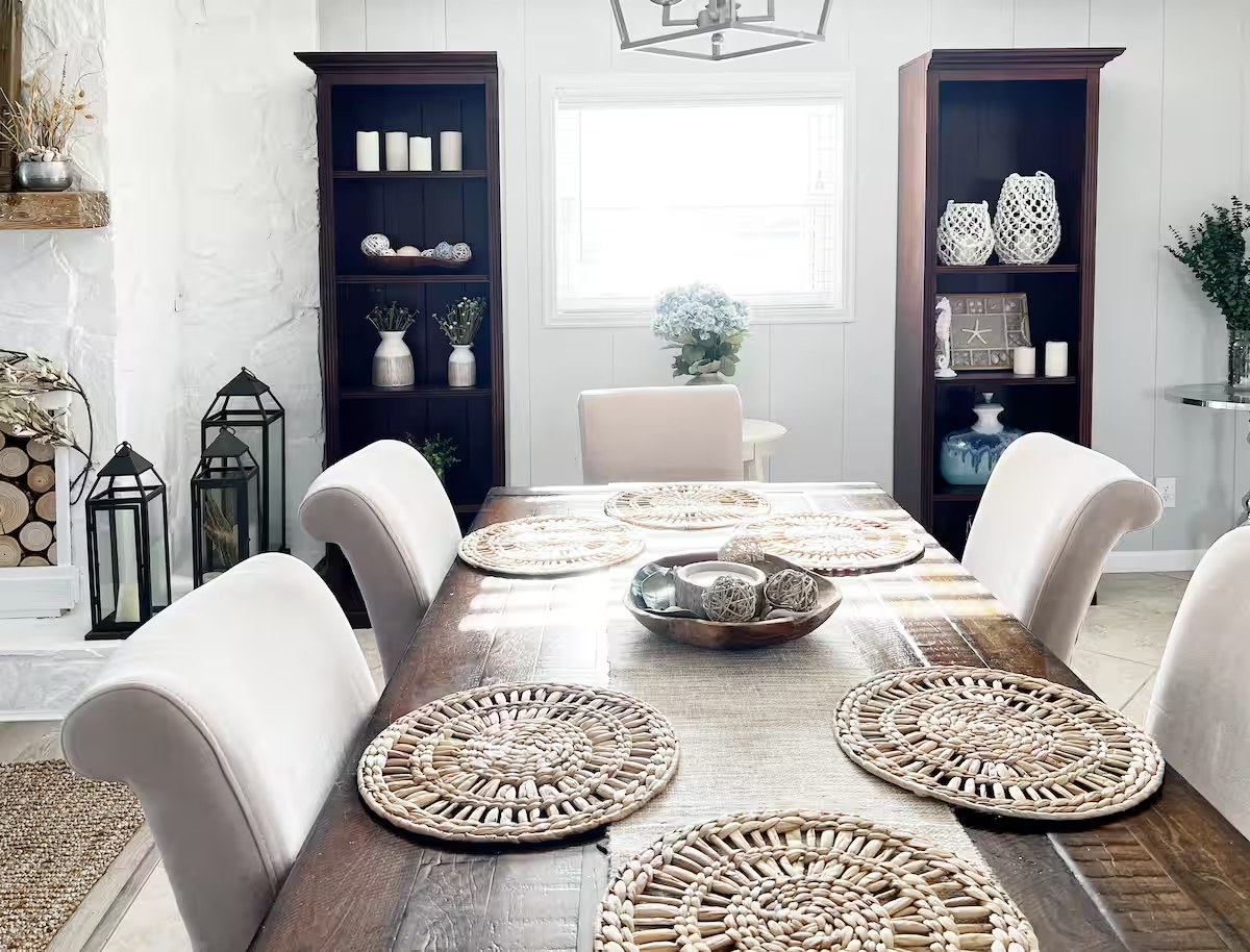 Dining table with bookshelves and candle decor