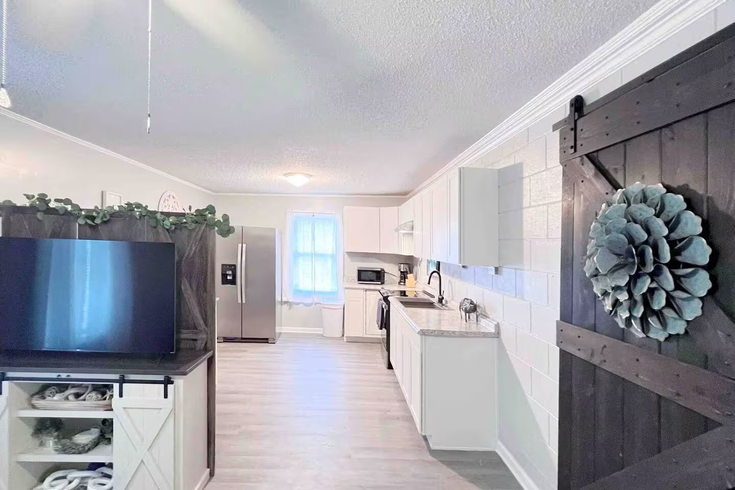 Open-concept view from living room toward the kitchen